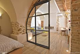 Loft Avec Verriere Cintree Mur En Pierre Maison Voute Interieur Maison Deco Maison
