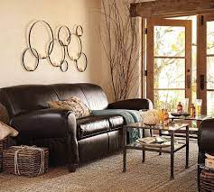 Retro Living Room Beige Color Paint Ideas With Rattan Accessories And Brown Sofa Brown Living Room Decor Living Room Color Schemes Wall Decor Living Room