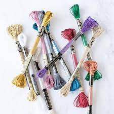 Remove the paper wrappings and form the floss into a loop. How To Cross Stitch With Dmc Metallic Embroidery Floss Stitched Modern