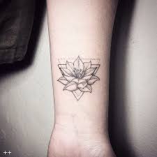 Black lotus flower wrist tattoo. Geometric Lotus Tattoo On Wrist