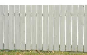 Tall trees surrounding the deck cloak the space in shade and block views of nearby neighbors. What Is A Privacy Wall With Picture