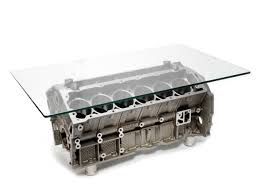 We are here to help you fulfil your dream with high quality bespoke automotive furniture from v8 to full bore v12 engine blocks. A Jaguar V12 Engine Block Coffee Table