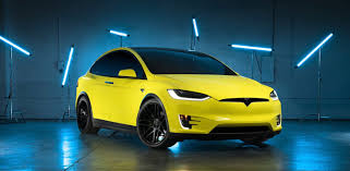 The vinyl is laminated and then placed directly over the car's original paint. Tesla Launches Its Own Car Wrap Service Electrek