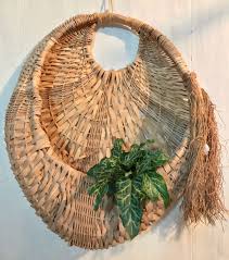 Vintage Large Woven Straw Wall Basket Rattan Wall Pocket With Fringe Boho Wall Decor By Ninedoorsvintag Baskets On Wall Bohemian Wall Decor Boho Wall Decor
