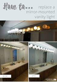 Replacing A Light Fixture On A Vanity Mirror Modern Master Bathroom Bathroom Light Fixtures Farmhouse Master Bathroom