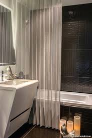 We have written a fresh list with sample photos to help you just now. 22 Bathroom Curtain Ideas For Your Personal Sanctuary