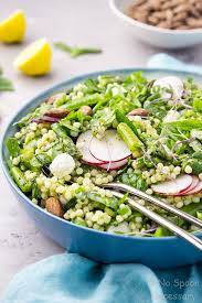 Pearl couscous, grape tomatoes, basil pesto, salt, sugar snap peas. Glowing Green Spring Couscous Salad With Lemon Basil Pesto Couscous Salad Couscous Recipes Vegetable Couscous Recipes