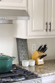 Because glass tiles set in a place with a strong adhesive, nothing may change your mind after a few weeks the installation, unless you want to repeat the entire project. Diy Painted Oak Kitchen Cabinets Makeover Average But Inspired