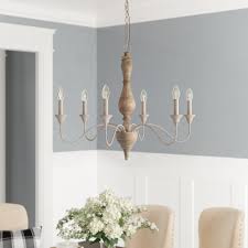 It's always a good idea to balance out your coastal blues with warm brown neutral accents like a beige bench or rope chandelier. French Country Chandeliers You Ll Love In 2021 Wayfair