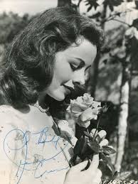 Autographed photos of Corrie cast.