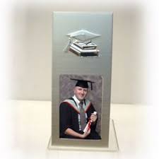 This 5 1/2 x 8 1/2 graduation frame features a graduation cap with a golden nylon. 19 Graduation Picture Frames Photo Albums Ideas Graduation Picture Frames Graduation Pictures Picture Frames