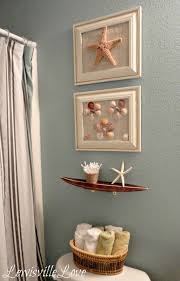 A lovely beach bathroom with mint green touches, fish scale tiles in the shower and a mint floating vanity and brass touches decor bring a coastal feel to your bathroom with gorgeous tiles in a chosen color: Nautical Bathroom Nautical Bathroom Decor Beach Theme Bathroom Bathroom Decor