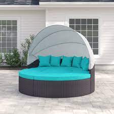 This swing that goes both ways, is a show stopper with its rounded bottom, welcoming back and seat cushions, and open relationship status. Sol 72 Outdoor Brentwood 86 5 Wide Outdoor Wicker Patio Daybed With Cushions Reviews Wayfair Ca