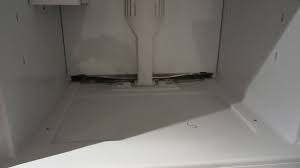 High power suction machine unclog roof drain. How To Prevent Water Collecting Inside Your Fridge By Fixing Your Freezer Drain 1000 Tools