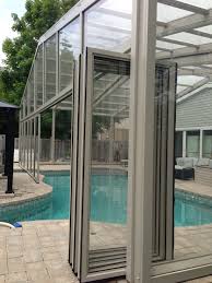 Maybe you would like to learn more about one of these? Bi Fold Doors Open On Pool Enclosure Indoor Outdoor Pool Sliding Deck Pool Cover Pool Enclosures
