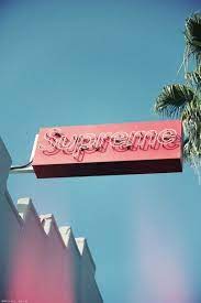 Guests enjoy the beach locale. Supreme Photo Wall Collage Neon Signs Neon Lighting