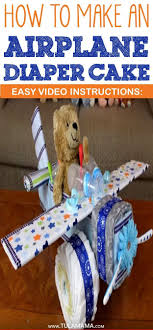 Motorcycle tricycle diaper cake | baby diaper cake moto atv (tutorial) in this video you will learn step by step how to make a. How To Make An Airplane Diaper Cake With Easy To Follow Video Instructions Airplane Diaper Cakes Diaper Cake Baby Shower Diaper Cake