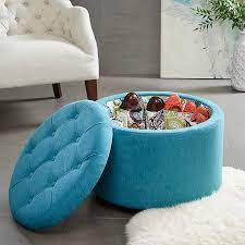 How to use an ottoman as a coffee table. Melinda Round Turquoise Storage Ottoman Kirklands
