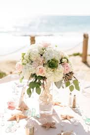 Pink And White Beach Wedding At Crystal Cove Beach Wedding Flowers Beach Wedding Decorations Reception Wedding Reception Centerpieces
