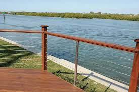 Cable rail offers modern design properties by utilizing metal posts and handrails, but can also be combined with wood stair parts. Deck Cable Railing Stainless Steel Railing System