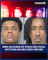 Police say two men and a minor are accused of robbing a Domino's delivery  driver in Roosevelt, pushing him to the ground and spitting