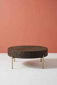 Check spelling or type a new query. Kadida Round Carved Wood Coffee Table
