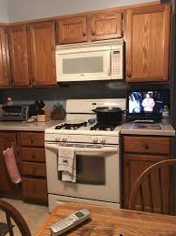 Painted cabinets vs stained cabinets i love oak cabinets. Would Love To Paint My Oak Cabinets White But My Appliances Are Almond Hometalk