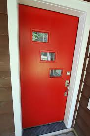 The first three orange doors sport a simple frame with clean, geometric a yellow door is most commonly paired with a dark grey or stark white exterior. Mid Century Modern Doors Red Front Door Best Front Door Colors Front Door Makeover