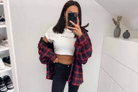 Short skirts, black boots, bold lipstick and long hair. 39 Flannel Fall Outfits Style Tips How To Wear Your Favorite Shirt