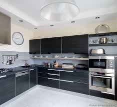 Black cabinets with an impressive island. Black Modern Kitchen Cabinet Design Cabinet Chasseur