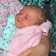 Snuggle Snuggle…she is not feeling well and wants mommy snuggles 24/7. …and  maybe take a few pics 😂 and read some of the Greatest Love Story!!!