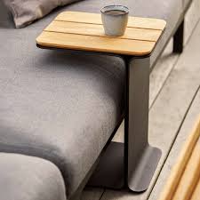 Featuring a finely sanded round top made of sturdy wood planks. Cane Line Mega Side Table