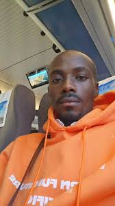 Kikuyu Men Choosing Their Caps