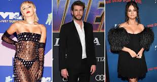 Noted for her distinctive raspy voice. Miley Cyrus Licked A Pen S Cake On Liam Hemsworth S Birthday Lost Hotel Transylvania To Selena Gomez