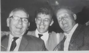 Cindy Nielsen , My great-uncle Dougal McCubbin is third in the back row in  this photo, I have no idea who any of the others are