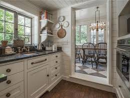 Designer richard ouellette of les ensembliers transforms an old montreal tudor home into a space with plenty of warmth and character. Historic English Tudor House Tour Entry Living Room Kitchen Design Inspiration Hello Lovely