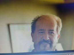 Identification of Lupe Garcia, a local barber in Las Vegas, New Mexico