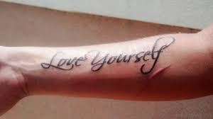 A visible tattoo in black on the right upper arm can be just as vivid as the wildest, most vibrant color tattoo on the shoulder blade. 18 Cool Love Yourself Tattoos On Wrist