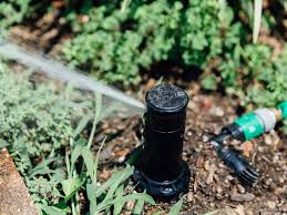 Adjust the watering range of the sprinkler head before installing it. How To Make A Cheap Simple Lawn Sprinkler System Cnet