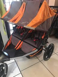 Bob Revolution Double Stroller In Great Condition Slight Sun Fade On Fabric But No Rips Folds Very Easi Double Jogging Stroller Jogging Stroller Bob Stroller