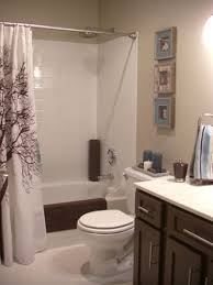 More Beautiful Bathroom Makeovers From Rate My Space Brown Bathroom Decor Bathroom Makeover Small Bathroom Makeover