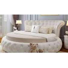 A bed frame can be made of metal or wood and is designed into different shapes including rectangular and round frames. Maple Wood White Round Double Bed For Home Rs 70000 Piece S S Furniture Works Id 22457933312