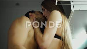 Close up man kissing face and neck of wo... | Stock Video | Pond5