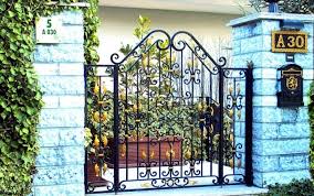 The modern look is complemented by horizontal boards and black metal hardware. Wrought Iron In Architecture 107 Fences And Railings Interior Design Ideas Ofdesign