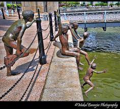 Kids Jumping In River Statue Raffles Place Singapore Singapore Sights Statue Singapore