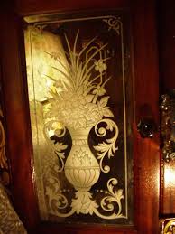 Acid etching can help create intricate patterns like floral or geometric designs while letting you play around with colours and can be back painted as well for further frosted glass is a type of etched glass produced by the sandblasting or acid etching of clear sheet glass and has a white appearance. Early 1900 S Horse Wagon Mirror Engraved Flower Design