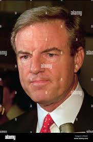 Arkansas Gov. Jim Guy Tucker listens to reporters questions at the Little  Rock federal courthouse Monday, Aug. 28, 1995. Tucker pleaded innocent to  Whitewater related charges Monday. (AP Photo/Gary Hawkins Stock Photo -
