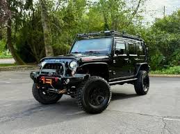 Image result for Brilliant Black 2009 Jeep