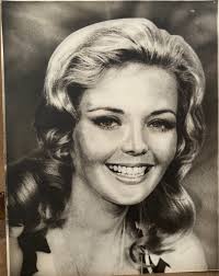 My autographed photo signed by Robert Morgan, and my research paper from  high school, also signed by Robert Morgan.