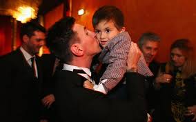 Image result for PIC OF RONALDO WITH HIS SON/MESSI WITH HIS SON